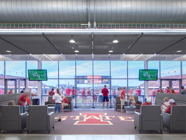club seating at Jack Trice Stadium with the Iowa State logo on the floor
