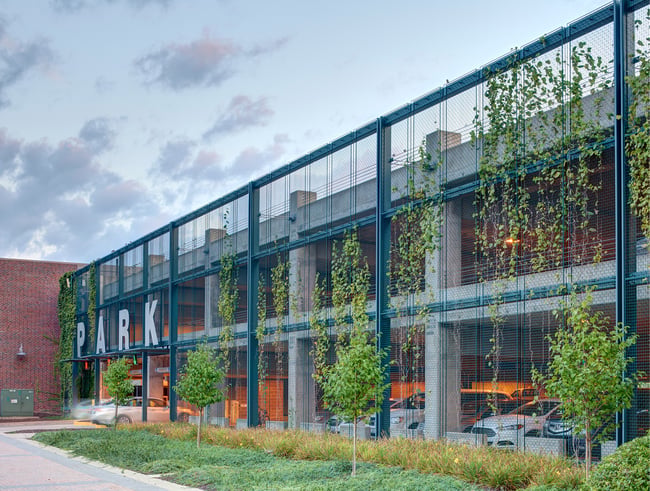 parking facility with plantings near the entrance