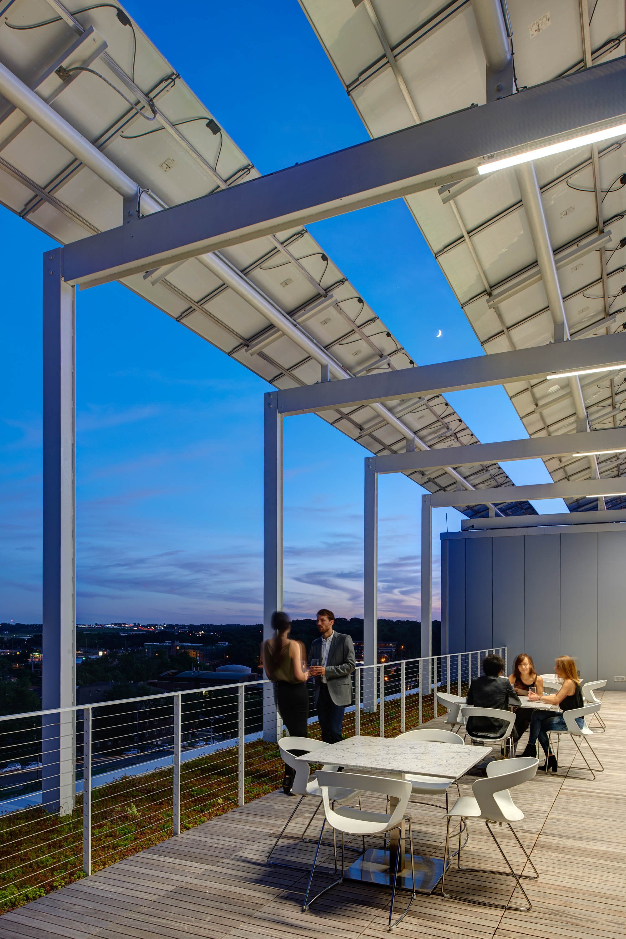 Guests beneath a solar array 