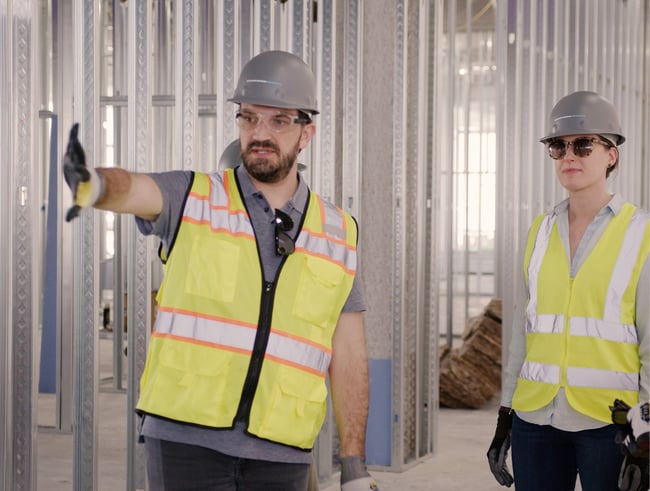 a structural engineer and architect on a construction site