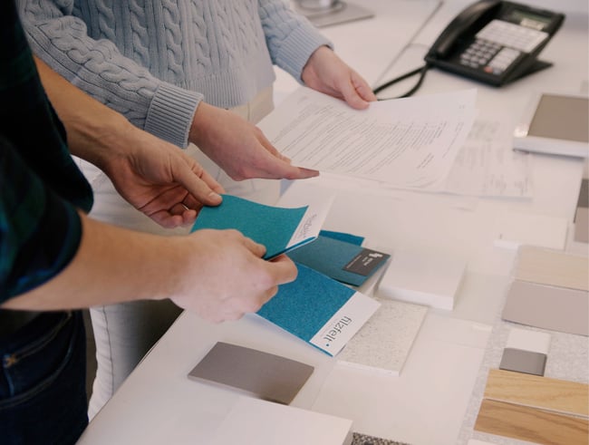 an interior designer selecting interior materials
